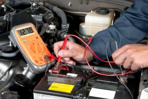 Man testing a car battery